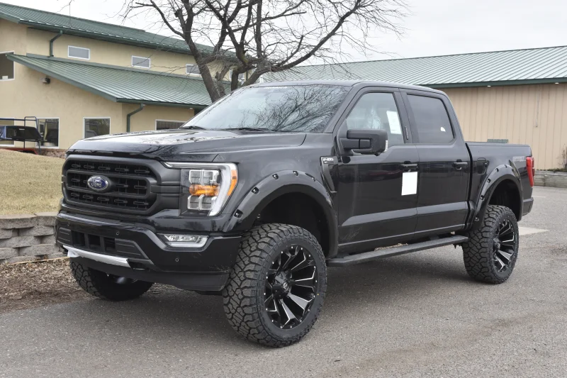 2021 Ford F150 LIFT Package by Waldoch Black truck with Black wheels by Waldoch Crafts