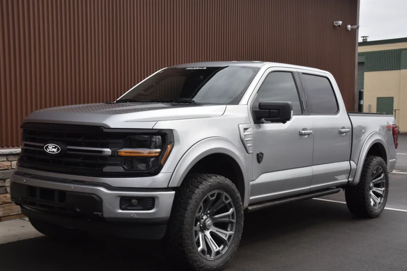 Custom Ford F150 M80X By Waldoch Silver Custom 22" wheels with 35" tires by Waldoch Crafts
