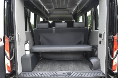 CUSTOM SHUTTLE LUXURY VAN GALAXY INTERIOR WITH SHUTTLE SEATING 11 PASSENGER 148 MEDIUM ROOF REAR SOFA FOLDS INTO BED BY WALDOCH - 2019 FORD TRANSIT GALAXY - Image 12 of 41