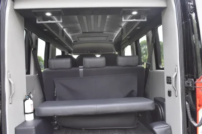 CUSTOM SHUTTLE LUXURY VAN GALAXY INTERIOR WITH SHUTTLE SEATING 11 PASSENGER 148 MEDIUM ROOF REAR SOFA FOLDS INTO BED BY WALDOCH - 2019 FORD TRANSIT GALAXY - Image 14 of 41