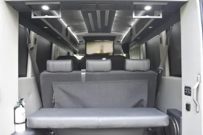 CUSTOM SHUTTLE LUXURY VAN GALAXY INTERIOR WITH SHUTTLE SEATING 11 PASSENGER 148 MEDIUM ROOF REAR SOFA FOLDS INTO BED BY WALDOCH - 2019 FORD TRANSIT GALAXY - Image 16 of 41