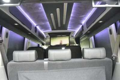 CUSTOM SHUTTLE LUXURY VAN GALAXY INTERIOR WITH SHUTTLE SEATING 11 PASSENGER 148 MEDIUM ROOF REAR SOFA FOLDS INTO BED BY WALDOCH - 2019 FORD TRANSIT GALAXY - Image 21 of 41