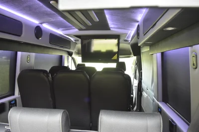 CUSTOM SHUTTLE LUXURY VAN GALAXY INTERIOR WITH SHUTTLE SEATING 11 PASSENGER 148 MEDIUM ROOF REAR SOFA FOLDS INTO BED BY WALDOCH - 2019 FORD TRANSIT GALAXY - Image 23 of 41