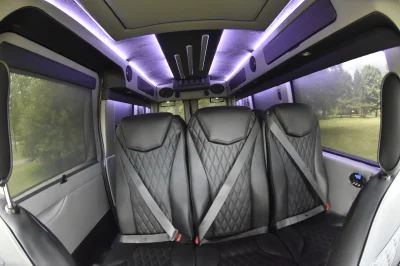 CUSTOM SHUTTLE LUXURY VAN GALAXY INTERIOR WITH SHUTTLE SEATING 11 PASSENGER 148 MEDIUM ROOF REAR SOFA FOLDS INTO BED BY WALDOCH - 2019 FORD TRANSIT GALAXY - Image 30 of 41