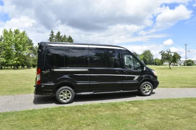 CUSTOM SHUTTLE LUXURY VAN GALAXY INTERIOR WITH SHUTTLE SEATING 11 PASSENGER 148 MEDIUM ROOF REAR SOFA FOLDS INTO BED BY WALDOCH - 2019 FORD TRANSIT GALAXY - Image 8 of 41