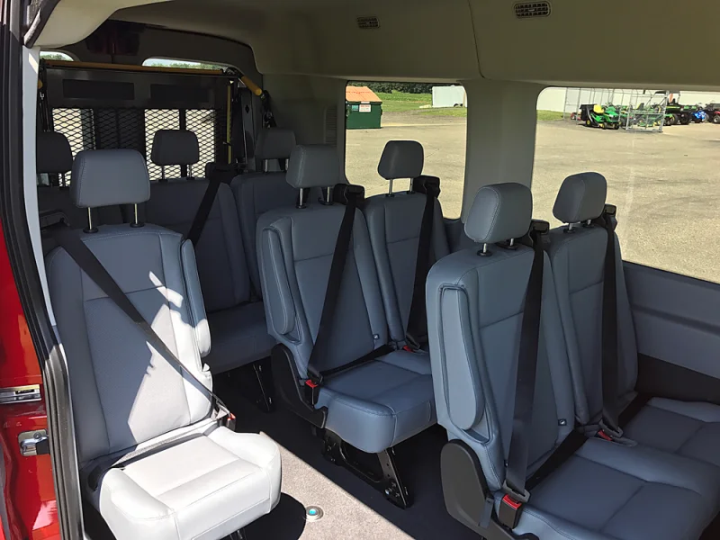 Red 130 Ford Transit Mobility ADA van with factory seating by Waldoch by Waldoch Crafts