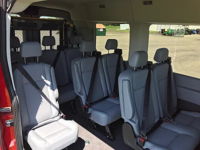 RED 130 FORD TRANSIT MOBILITY ADA VAN WITH FACTORY SEATING BY WALDOCH - 2020 FORD TRANSIT MOBILITY - Image 1 of 8