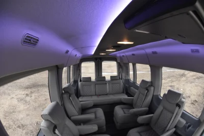 LANDMARK 9 PASSENGER LUXURY 148 MEDIUM ROOF FORD TRANSIT BY WALDOCH SILVER EXTERIOR AND GRAPHITE SEATING - 2021 FORD TRANSIT LANDMARK - Image 23 of 37