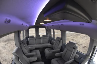 LANDMARK 9 PASSENGER LUXURY 148 MEDIUM ROOF FORD TRANSIT BY WALDOCH SILVER EXTERIOR AND GRAPHITE SEATING - 2021 FORD TRANSIT LANDMARK - Image 24 of 37