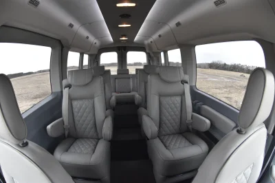 LANDMARK 9 PASSENGER LUXURY 148 MEDIUM ROOF FORD TRANSIT BY WALDOCH SILVER EXTERIOR AND GRAPHITE SEATING - 2021 FORD TRANSIT LANDMARK - Image 29 of 37