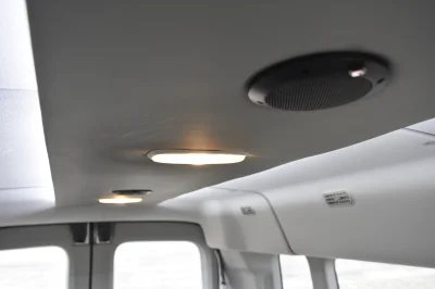 LANDMARK 9 PASSENGER LUXURY 148 MEDIUM ROOF FORD TRANSIT BY WALDOCH SILVER EXTERIOR AND GRAPHITE SEATING - 2021 FORD TRANSIT LANDMARK - Image 35 of 37