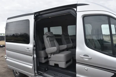 LANDMARK 9 PASSENGER LUXURY 148 MEDIUM ROOF FORD TRANSIT BY WALDOCH SILVER EXTERIOR AND GRAPHITE SEATING - 2021 FORD TRANSIT LANDMARK - Image 5 of 37