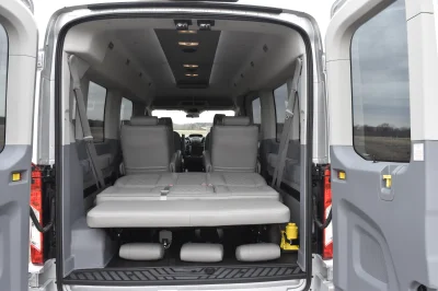 LANDMARK 9 PASSENGER LUXURY 148 MEDIUM ROOF FORD TRANSIT BY WALDOCH SILVER EXTERIOR AND GRAPHITE SEATING - 2021 FORD TRANSIT LANDMARK - Image 10 of 37