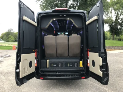 CUSTOM 148 EL 10 PASSENGER LIMO EXECUTIVE TRAVEL VAN WITH CUSTOM COMPANY LOGO BY WALDOCH THE BEST VAN CONVERSION - 2024 FORD TRANSIT GALAXY - Image 7 of 10