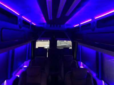 CUSTOM 148 EL 10 PASSENGER LIMO EXECUTIVE TRAVEL VAN WITH CUSTOM COMPANY LOGO BY WALDOCH THE BEST VAN CONVERSION - 2024 FORD TRANSIT GALAXY - Image 8 of 10