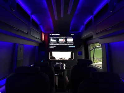CUSTOM 148 EL 10 PASSENGER LIMO EXECUTIVE TRAVEL VAN WITH CUSTOM COMPANY LOGO BY WALDOCH THE BEST VAN CONVERSION - 2024 FORD TRANSIT GALAXY - Image 9 of 10