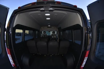 10 PASSENGER SHUTTLE BLACK EXTERIOR WITH CLOTH BLACK SEATING BY WALDOCH FLEET PASSENGER VAN SCHOOL HOTEL - 2019 RAM PROMASTER SHUTTLE - Image 8 of 46