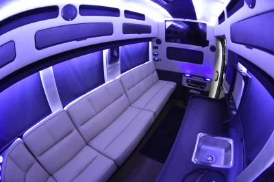 CUSTOM LIMO ON RAM PROMASTER 159 EXT BLACK BAR SEATING 10 PASSENGER CONVERSION VAN BY WALDOCH - 2020 RAM PROMASTER LIMO - Image 1 of 30