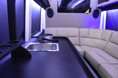 CUSTOM LIMO ON RAM PROMASTER 159 EXT BLACK BAR SEATING 10 PASSENGER CONVERSION VAN BY WALDOCH - 2020 RAM PROMASTER LIMO - Image 6 of 30